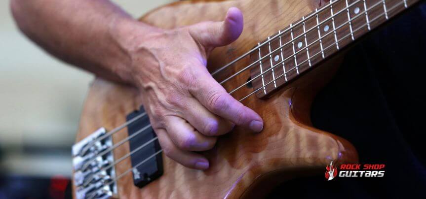 playing bass with thumb