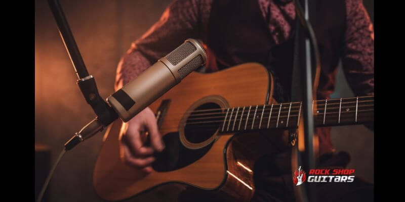 Why Do Acoustic Guitars Have High Action