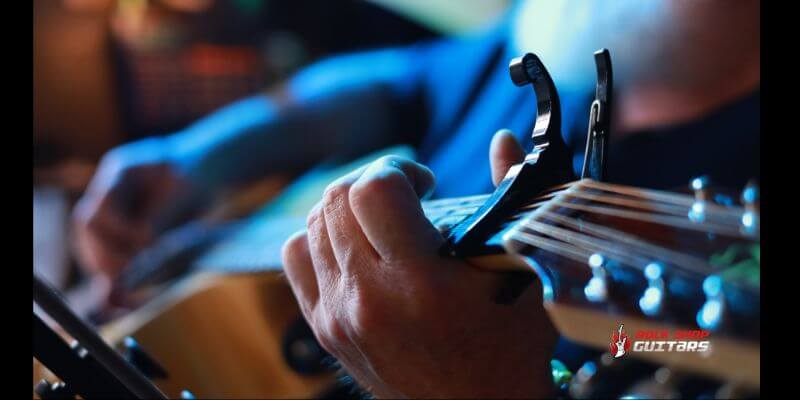 Can You Tune A Guitar With A Capo On